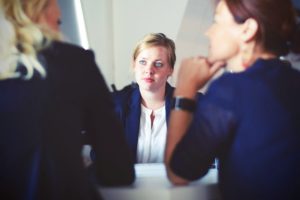 Women in blue suit at a meeting | Wonderland Marketing & Sales | Strategy, Brand, Digital, Social & Data | High-Impact Campaigns that Scale | Global Expertise, Proven Results, Blue Chip Credentials | For Entrepreneurs, SMEs, Corporates | Cherryl Martin